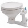 Manual toilet with large plastic cover